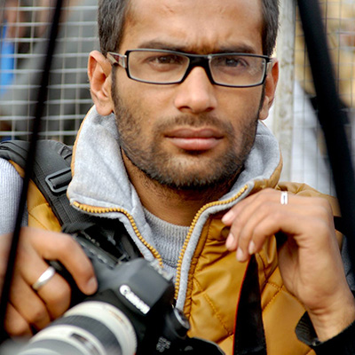 Police brutally attack journalist Adhikari for covering protest, try to smash his camera