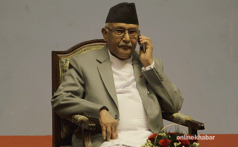 KP-Oli-with-Mobile